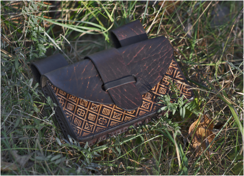 Dark brown leather belt pouch with pattern