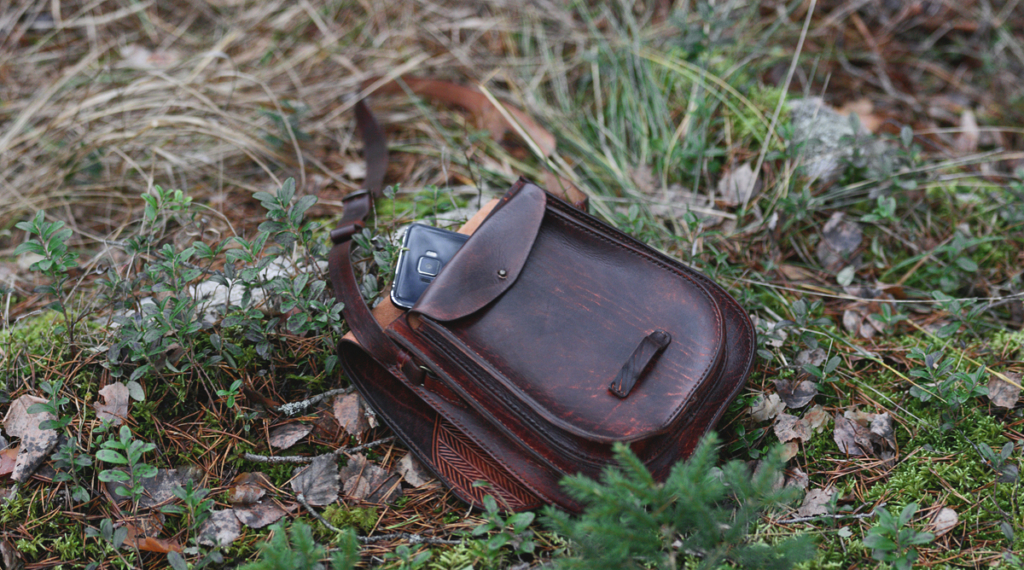 Dark brown leather handbag with Herringbone carvings
