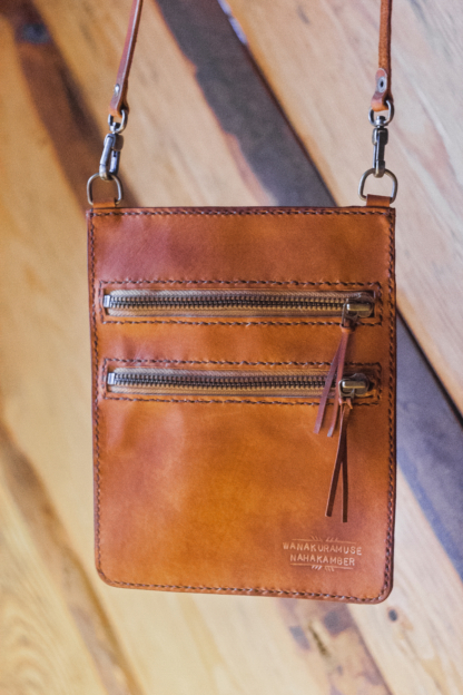 Brown leather neck wallet with zippers