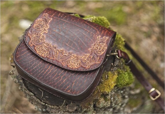 Leather handbag with hand carved floral pattern