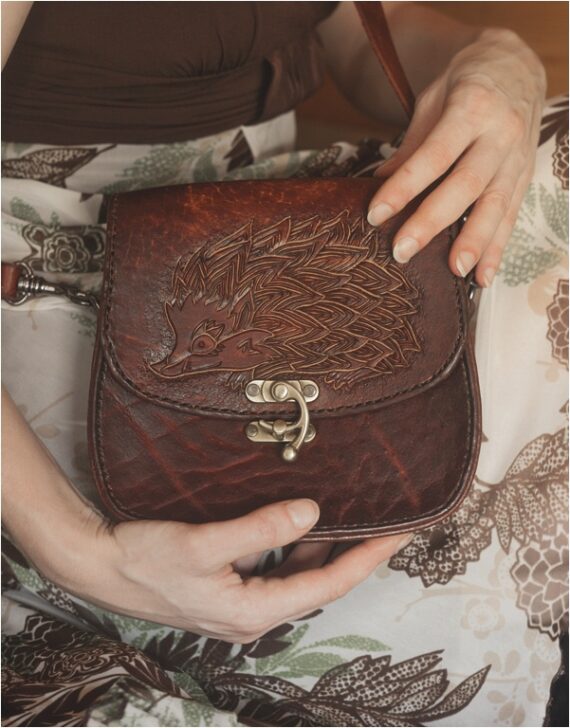 Leather handbag with a hedgehog