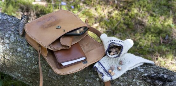 Leather handbag with hand carved deer