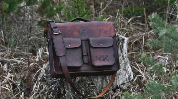 Dark brown leather briefcase with many pockets in various sizes