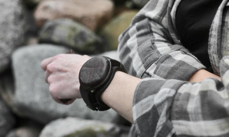 Leather watch strap with a cap
