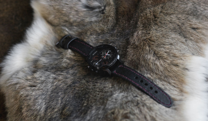 Black leather watch strap.