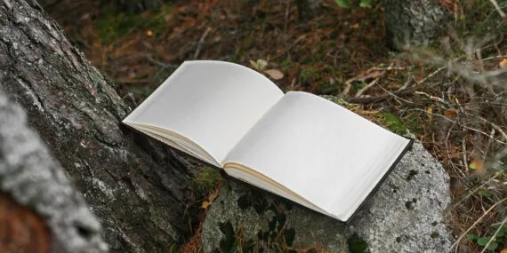 Leather cased photo album with name, inside