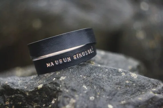 Black buffalo leather wristband with a message, handmade.