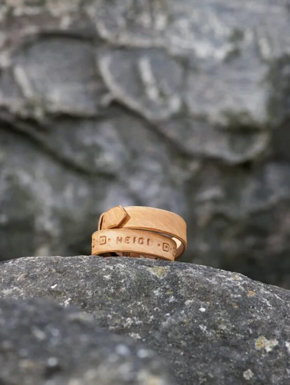 Wristbands for the whole class, with a name and small pattern. Handmade, vegetable tanned leather.