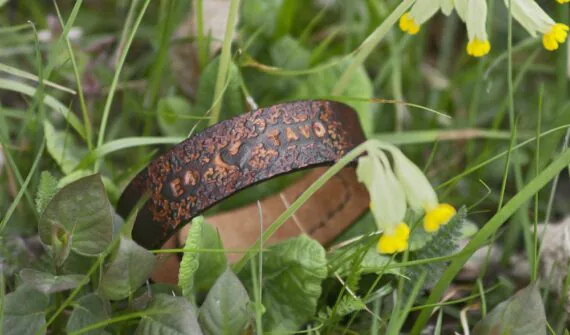 Brown leather wristband with personal message. Handmade.