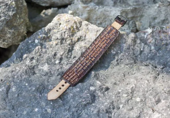 Carved leather bracelet with hidden message