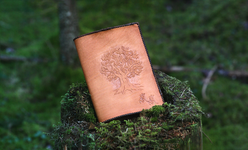 Leather book covers with hand carved oak tree