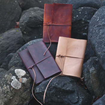 Notebook covers with a strap