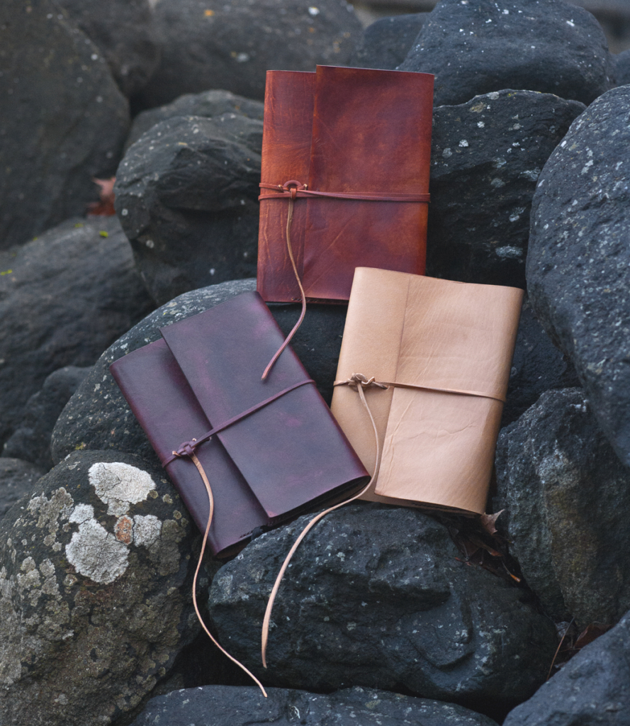 Notebook covers with a strap