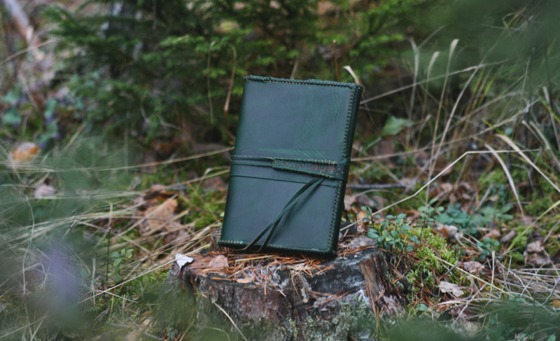 Green leather notebook covers with strap tie down