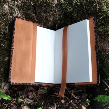 Leather notebook covers with an oak tree, view from inside