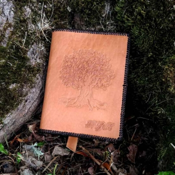 Leather notebook covers with an oak tree