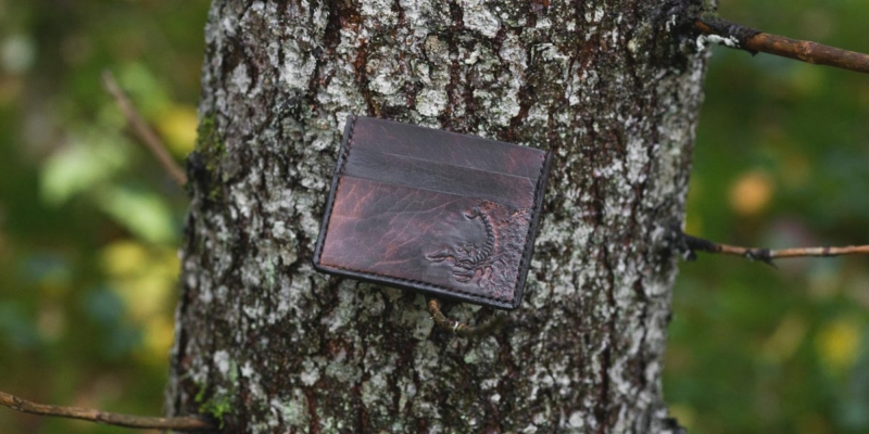 Leather card case with scorpion image