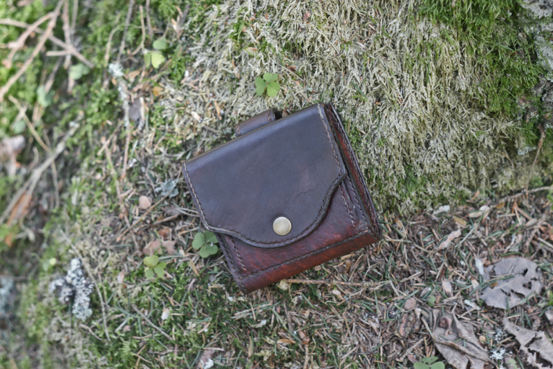 Dark brown leather wallet with fehu runes