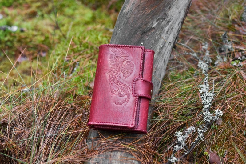 Red leather women's wallet with laced edges and phoenix