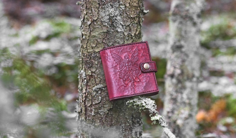Red leather wallet with fairy image