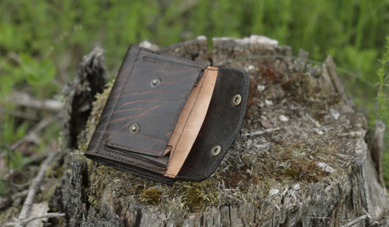 Leather wallet with carved runes