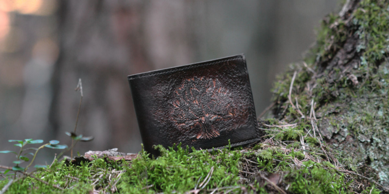 Wide leather wallet with carved oak tree