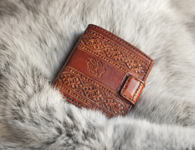 Full grain leather wallet with hand carved folk pattern