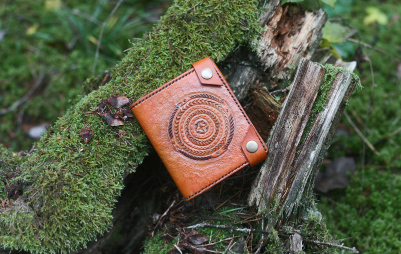Leather wallet with snakes image
