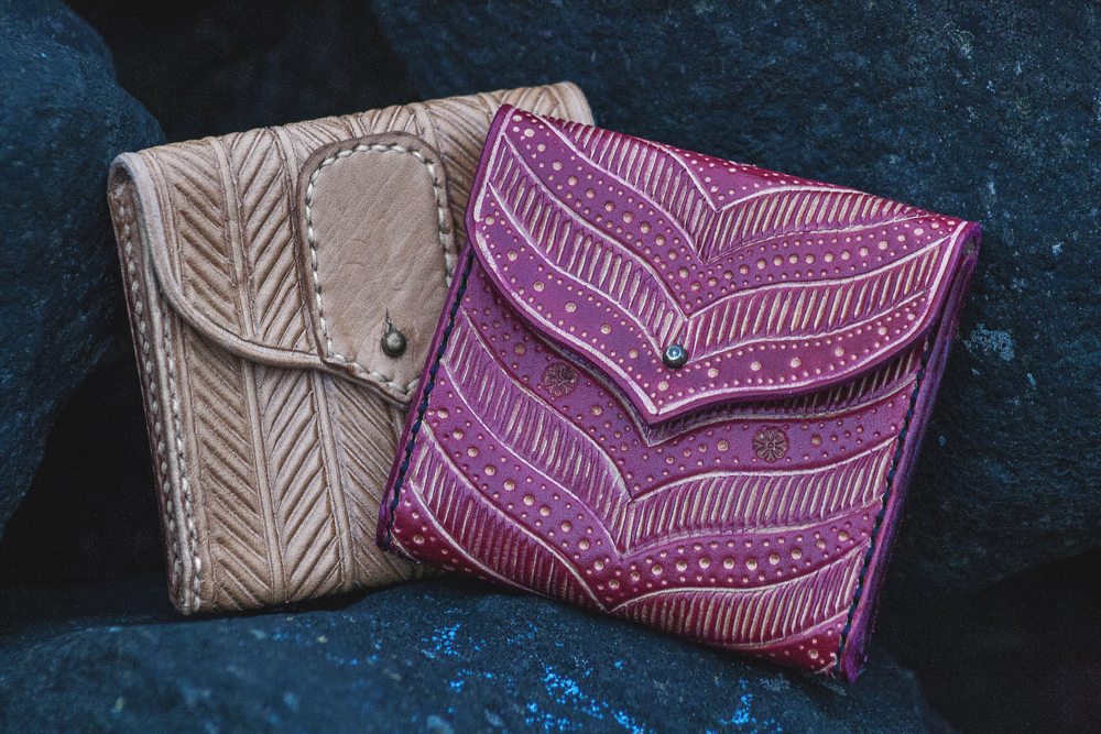 Leather small wallets with pattern.
