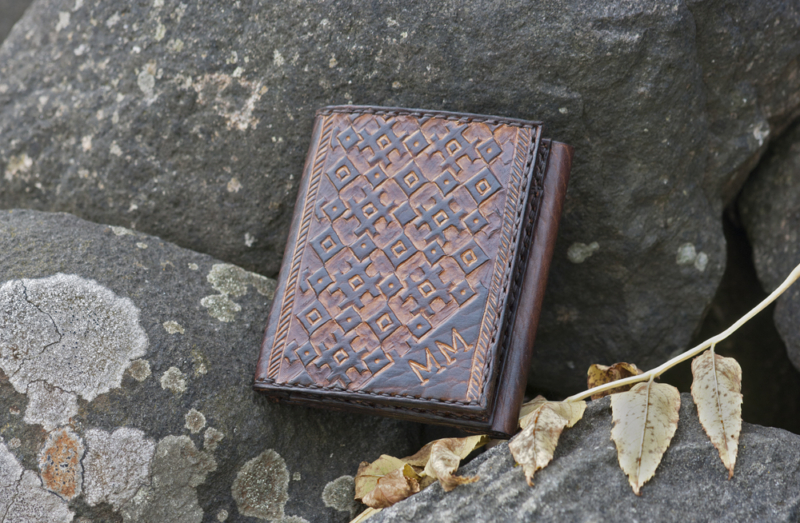 Dark brown carved leather wallet
