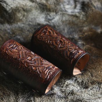 Leather cuffs with viking style carvings