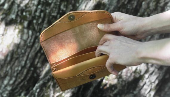 Large leather wallet for women, decorated by hand carved name - inside;